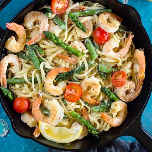 A bowl of food, with Shrimp and Linguine