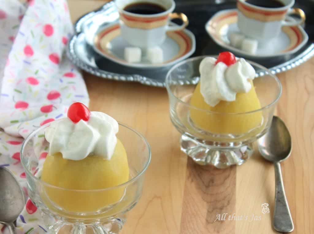 Glasses with poached apples, with coffee cups