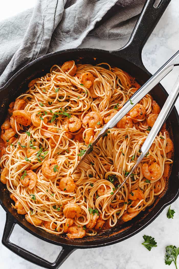 Angel hair pasta with spicy shrimp scampi in a cast iron skillet