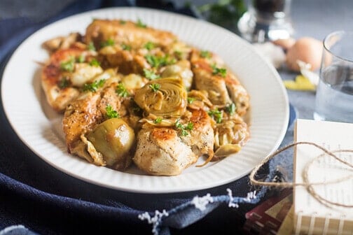 A bowl of food, with Chicken