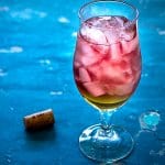 A glass of peach Bellini