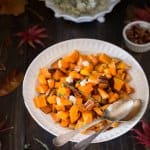 A bowl of food on a plate, with Squash