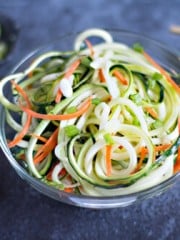 zoodles salad in a bowl with chopsticks