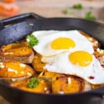 A pan of baked sweet potatoes and eggs.