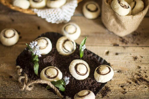 Cookies shaped like mushrooms in a tray