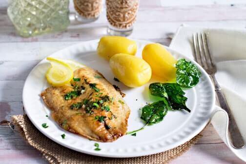 A plate of fish on a table