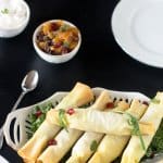 Spicy appetizers - fillo samosas placed on a plate