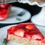 A close up of a slice of oatmeal strawberry cake