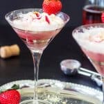 Wine and ice cream float in a martini glass on a silver platter