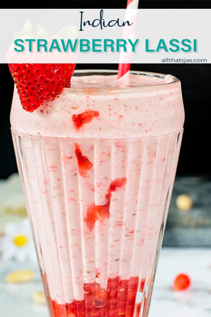 Close up glass with strawberry smoothie with text overlay,