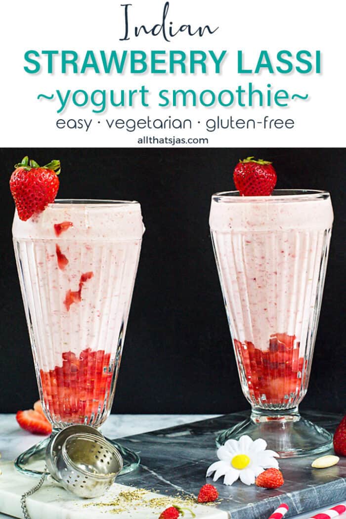 Two glasses with lassi and strawberries on the rim with text overlay.