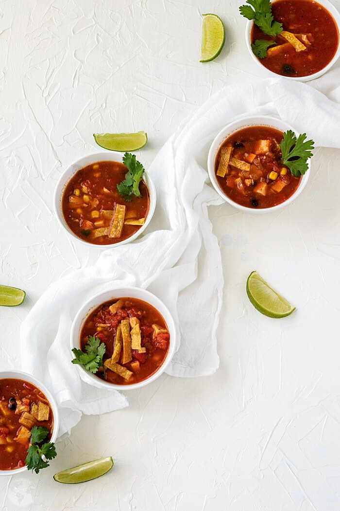 A lineup of 5 bowls of super delicious homemade Mexican chicken soup recipe
