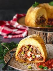 A front shot of sliced Neapolitan Sausage Meatballs and Rice Timbale