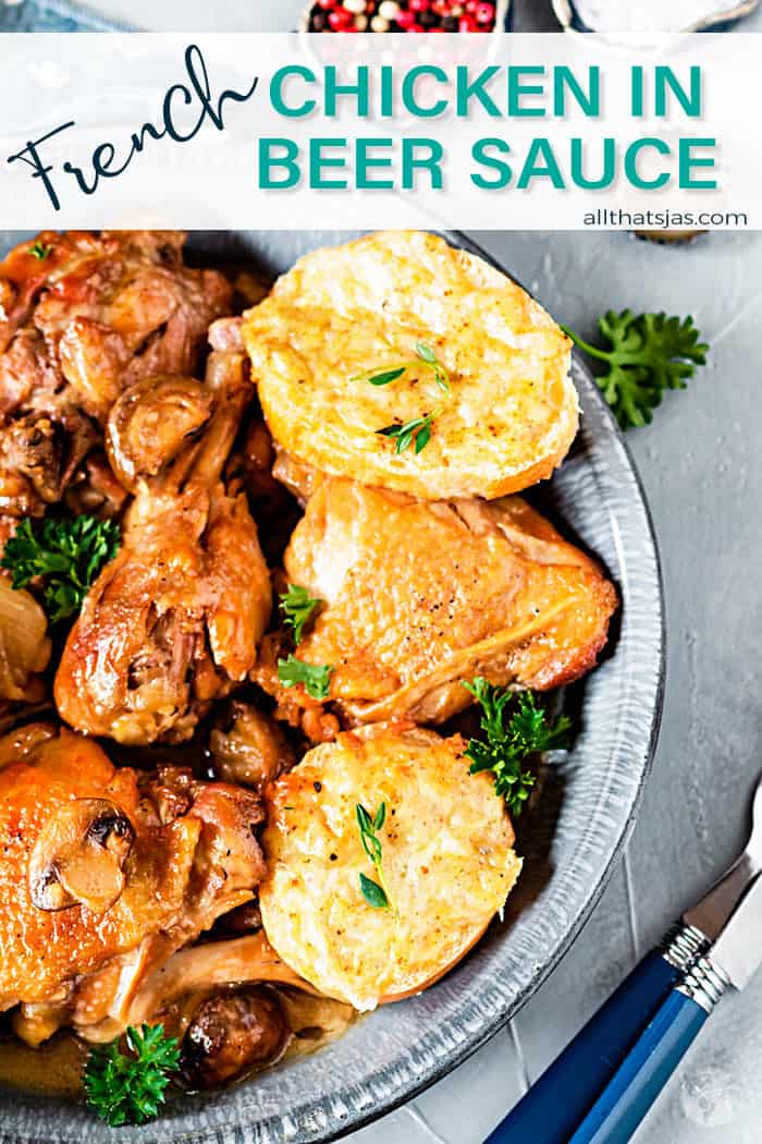 Chicken with beer sauce and cheesy bread in a gray plate with text overlay