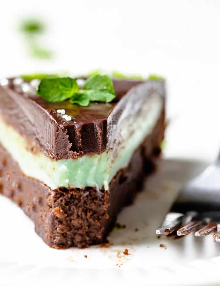 A slice of mint cake bitten off and with fork