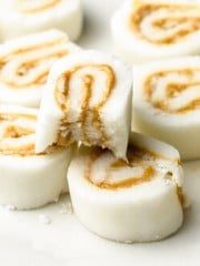 Pieces of sliced potato candy with peanut butter.