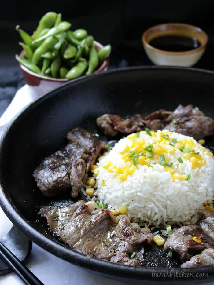 beef steak strips and rice in cast ironware