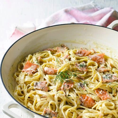 Cast-iron skillet with fettuccine and lox.
