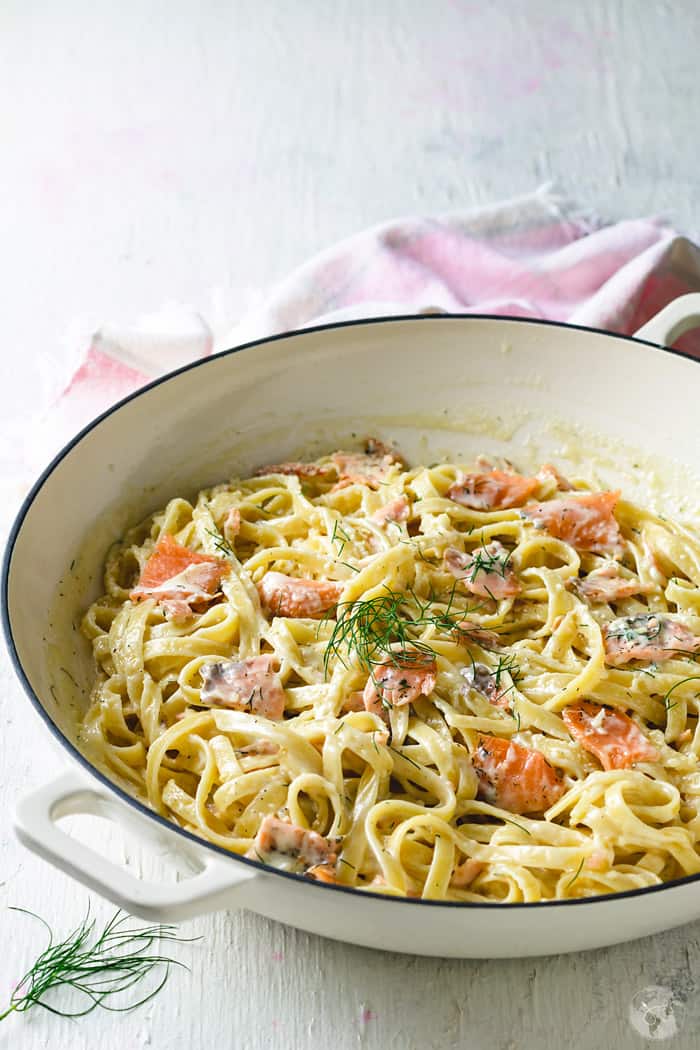 Cast-iron skillet with fettuccine and lox.