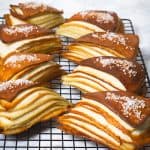 Pretzels lined up on a rack.