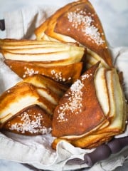 Pretzel wedges stacked in a basket.