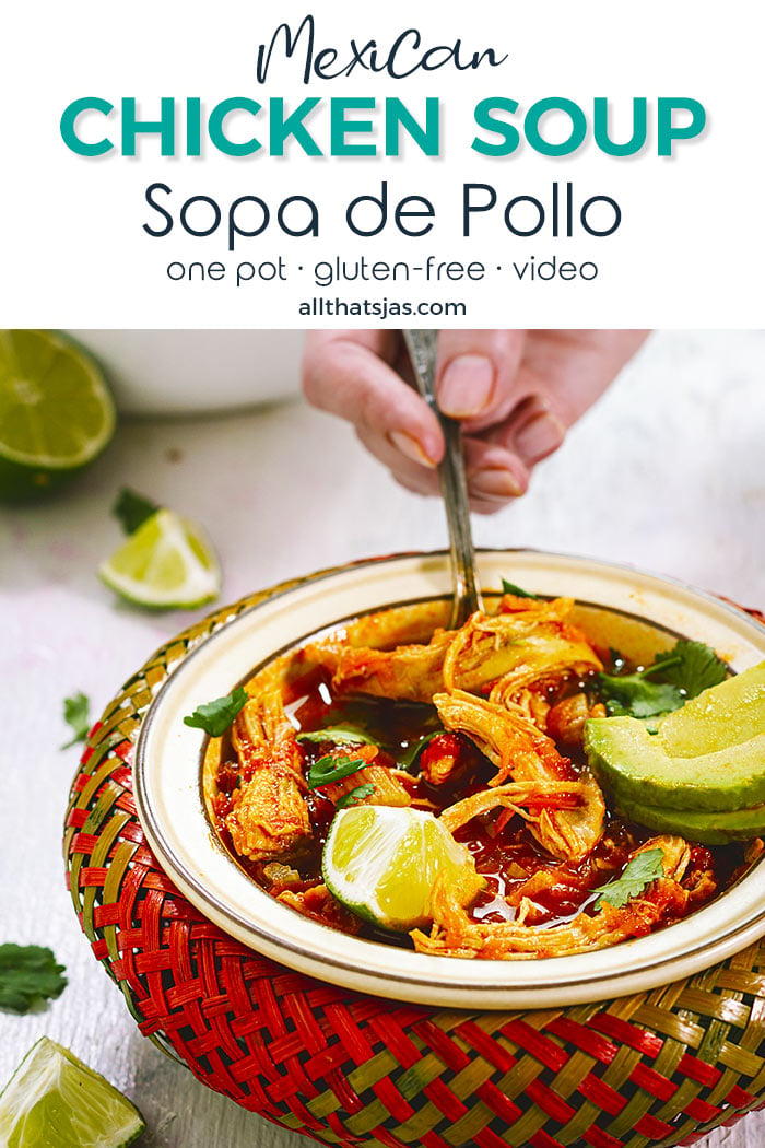 Mexican chicken soup in a colorful bowl, with a hand holding a spoon - with text overlay