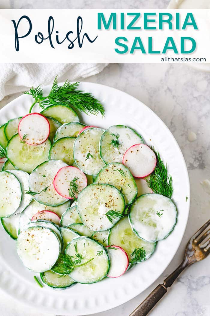 Overhead shot of Polish cucumber salad in a white plate with text overlay.
