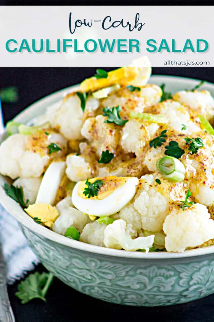 Piled up salad in a bowl with text overlay.