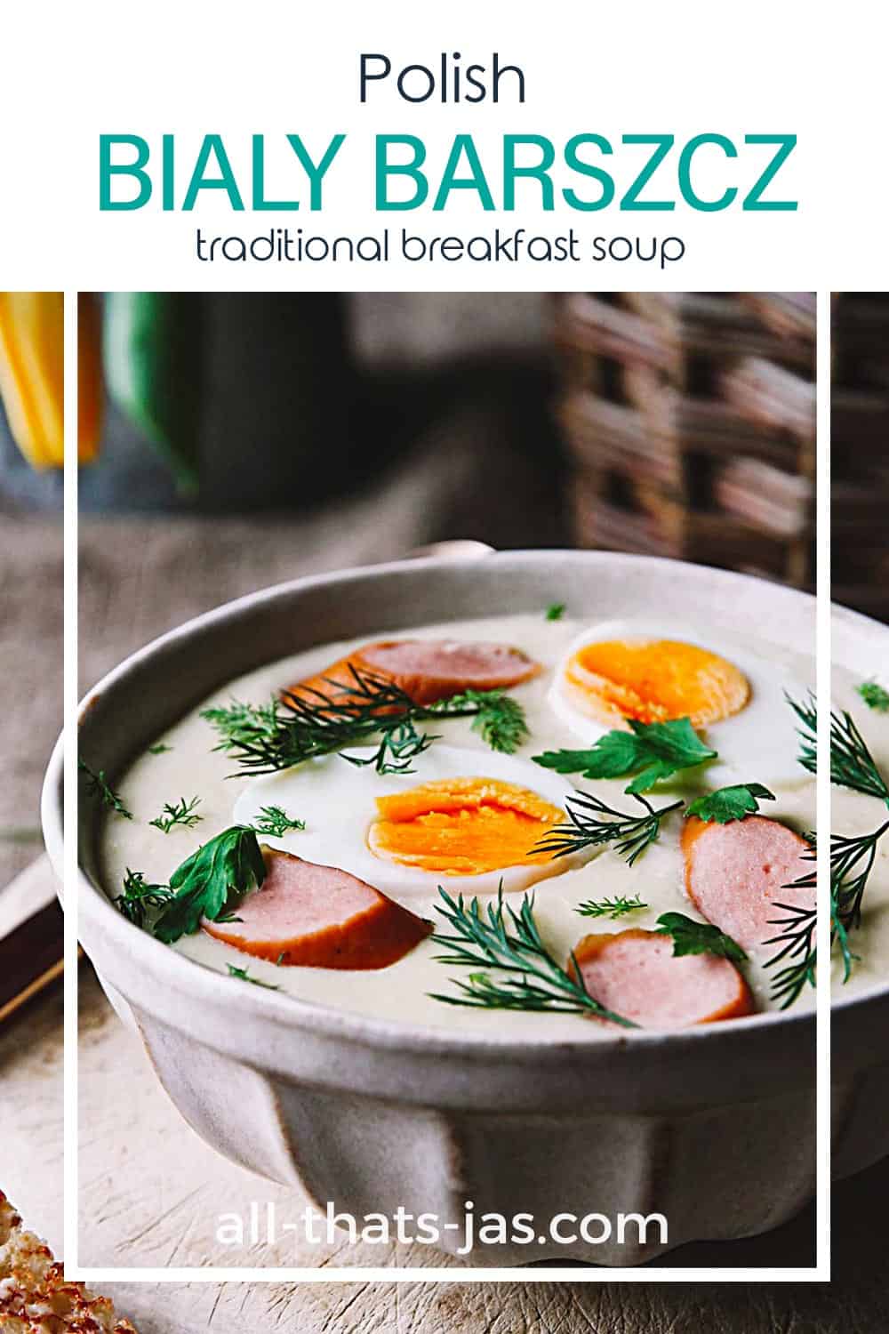 A close up of white soup with eggs, dill, and sausage with a text overlay.