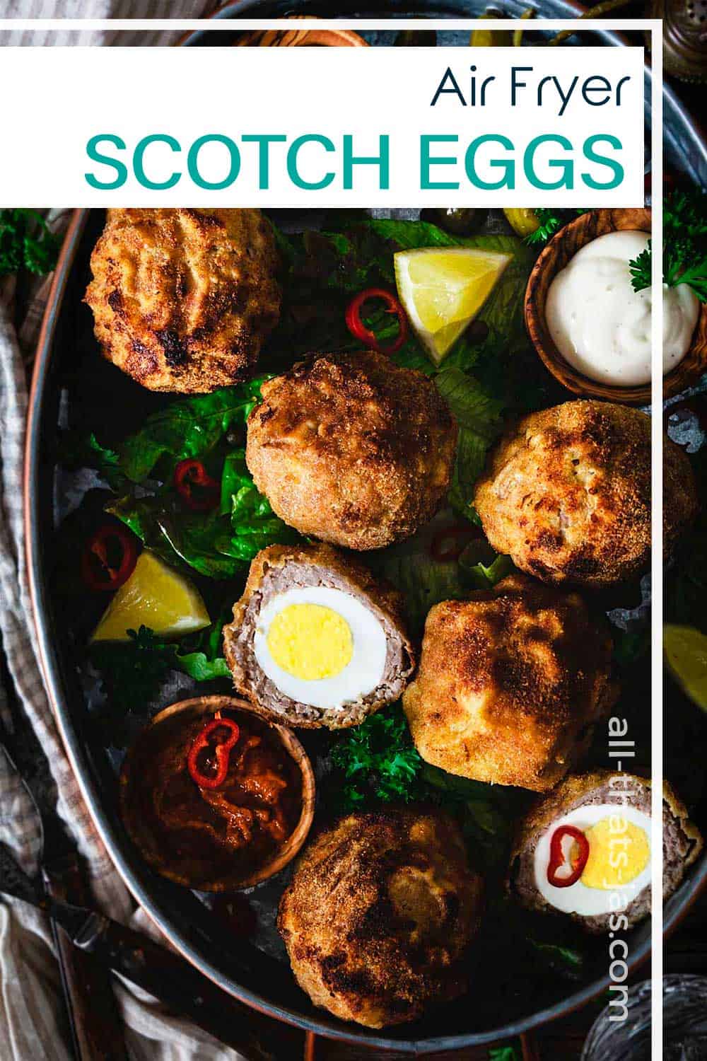 Whole and halved Scotch eggs with text overlay.