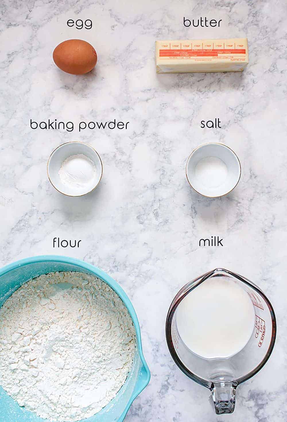 Ingredients for no yeast milk bread on a counter.