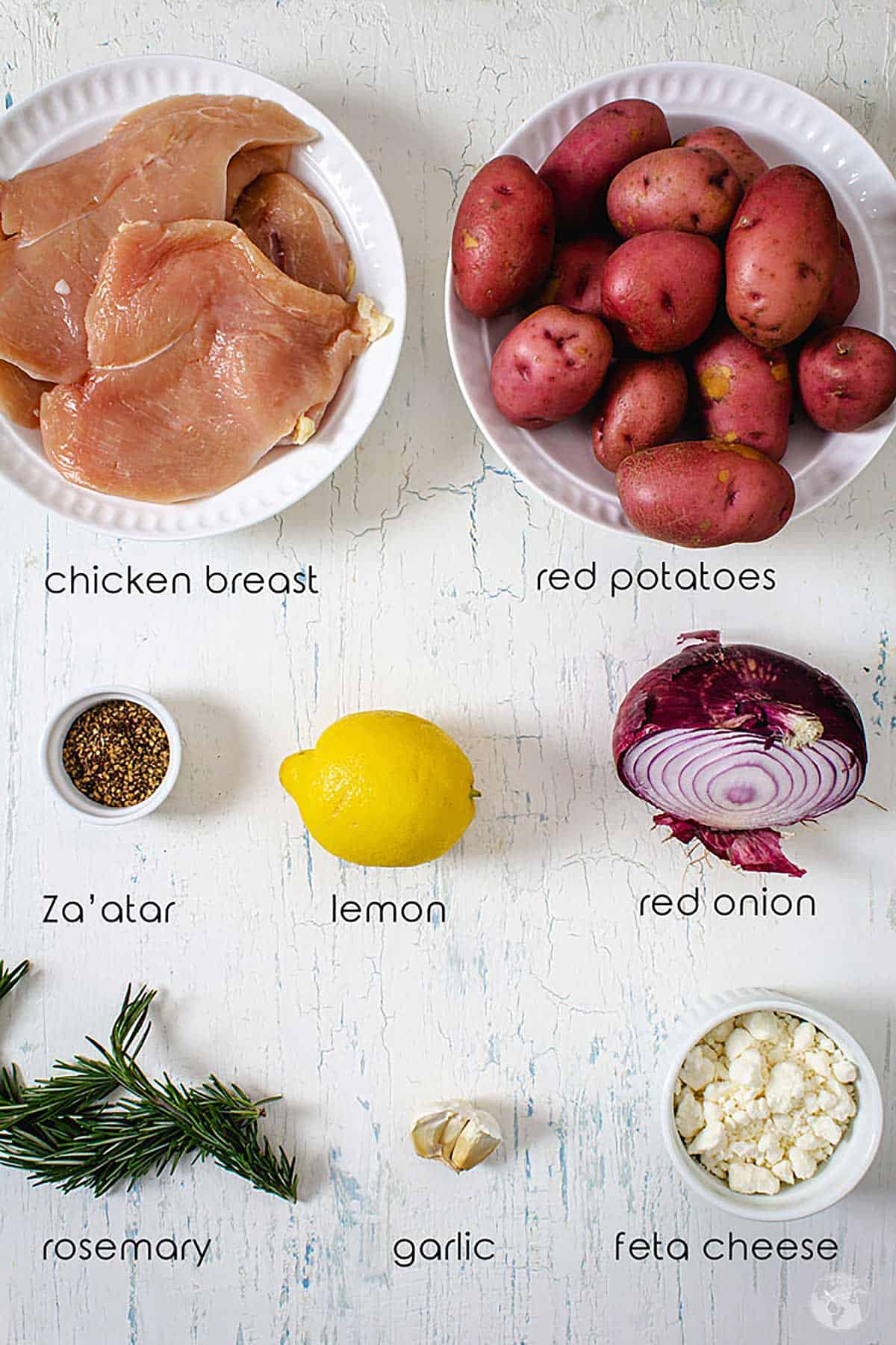Ingredients for the best Mediterranean chicken recipe on the counter.