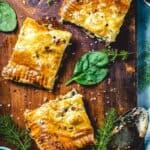 Slab pie slices on a cutting board.