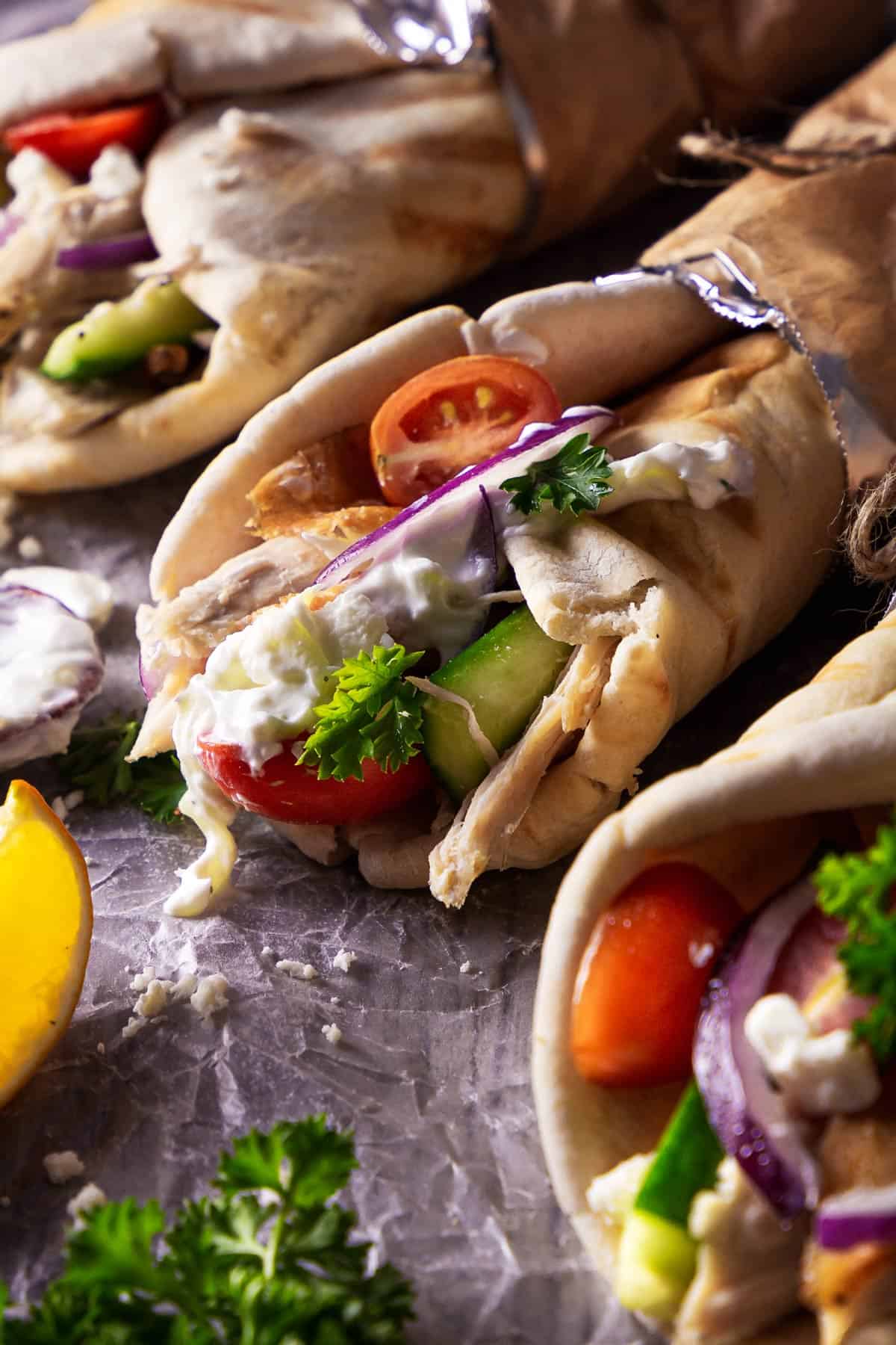 Gyros with leftover Thanksgiving turkey, tomatoes, cucumbers, onions, and tzatziki sauce.