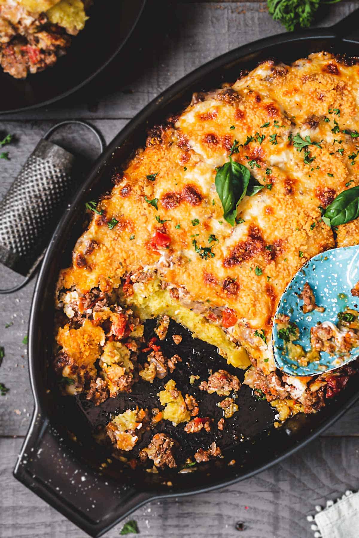 A close up of beef casserole with polenta.