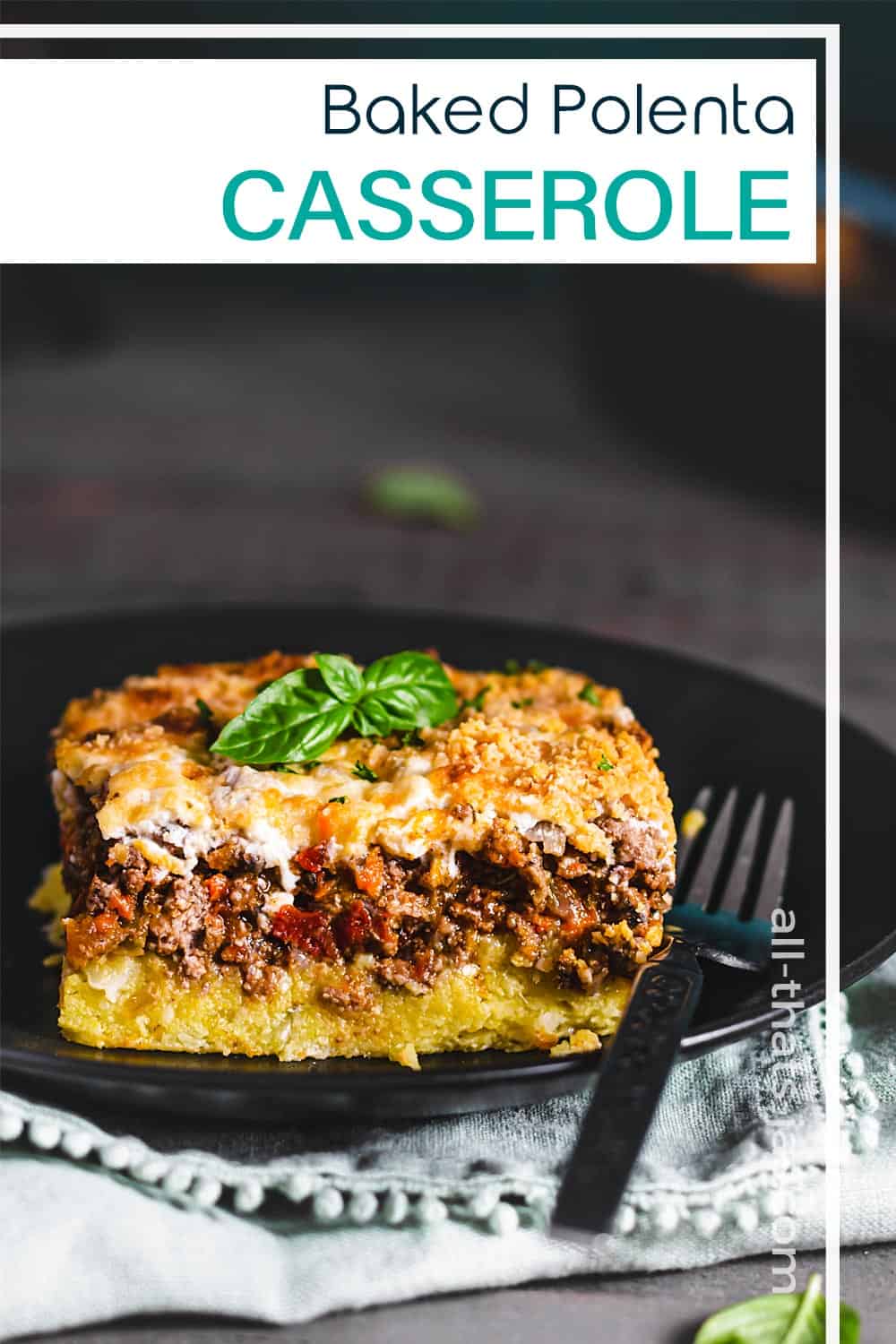 A serving of beef and polenta casserole with text overlay.
