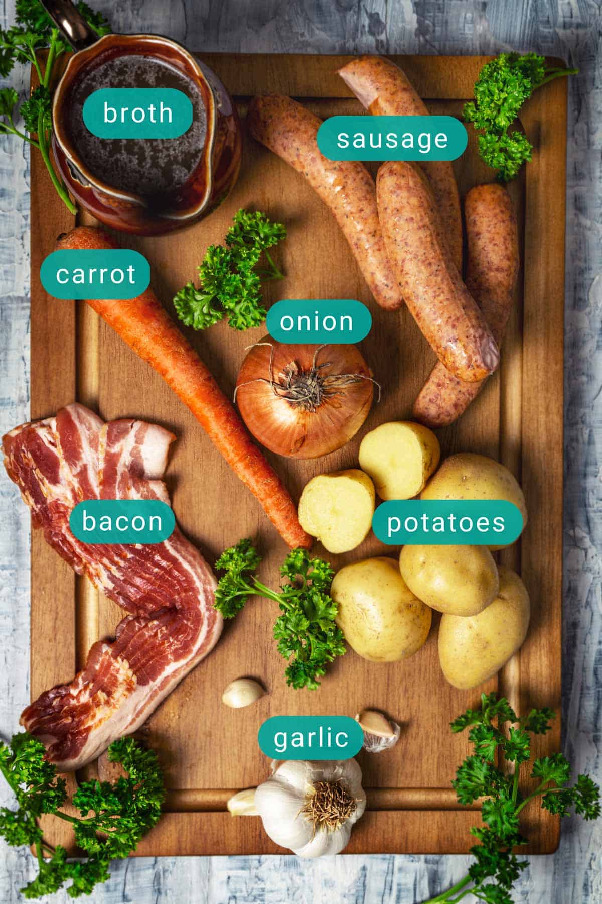 Ingredients for Dublin Coddle recipe on a wooden cutting board.