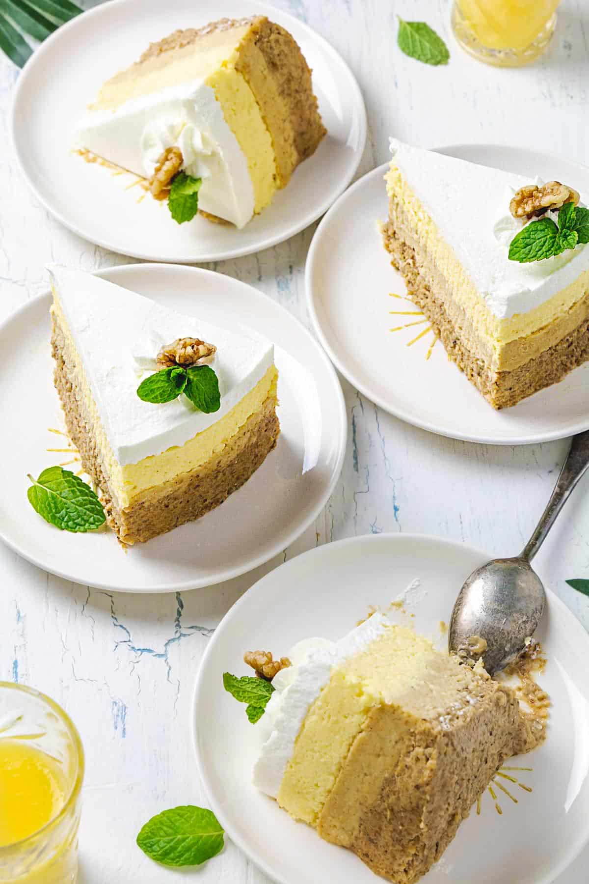 Four slices of sand cake on small plates. 