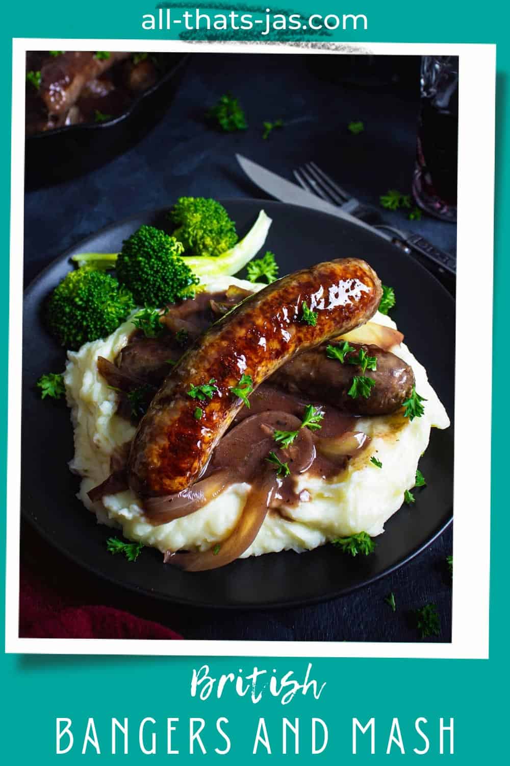 A plate of British bangers and mash dish with text overlay.