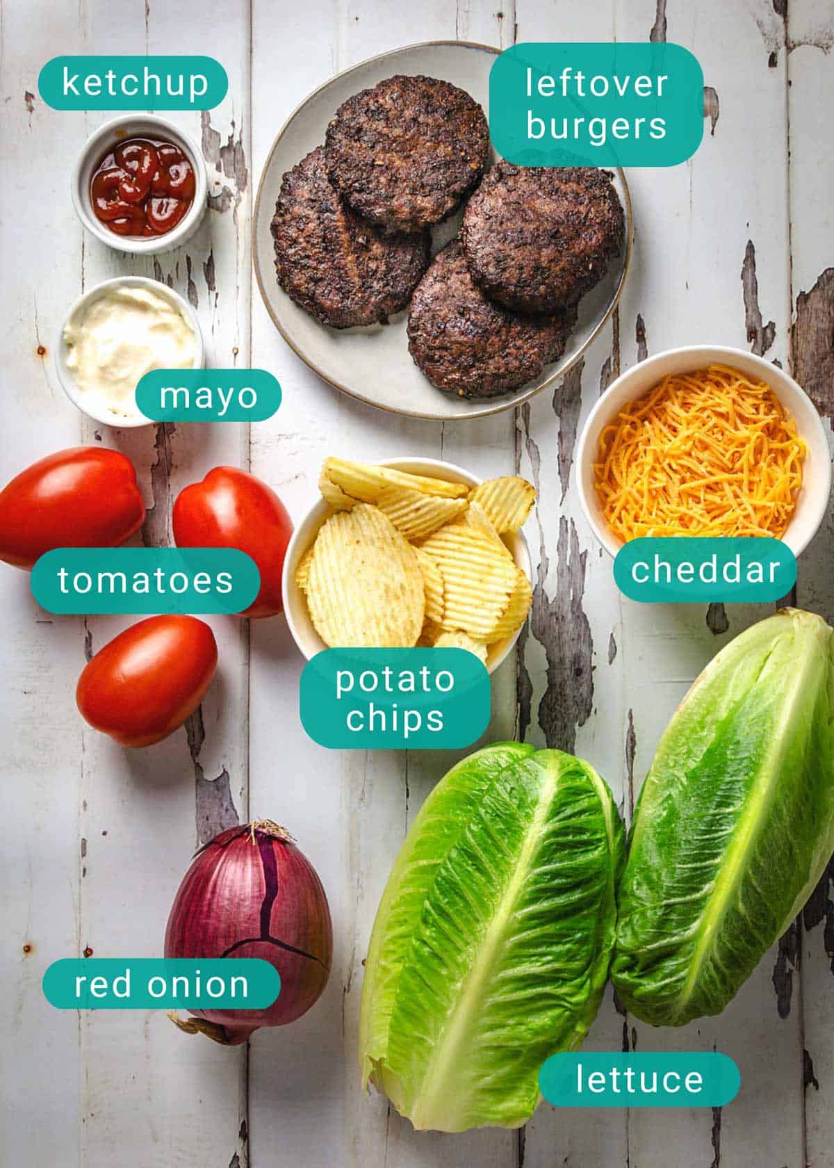 Cheeseburger salad ingredients on the counter.