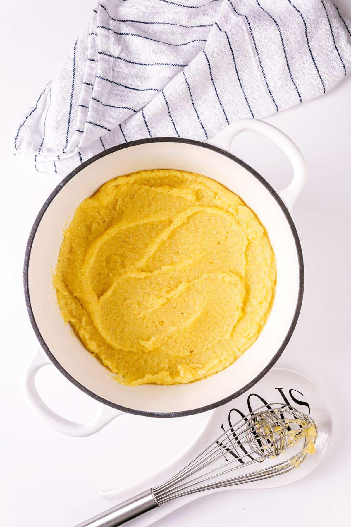 Creamy cooked polenta in a pot.