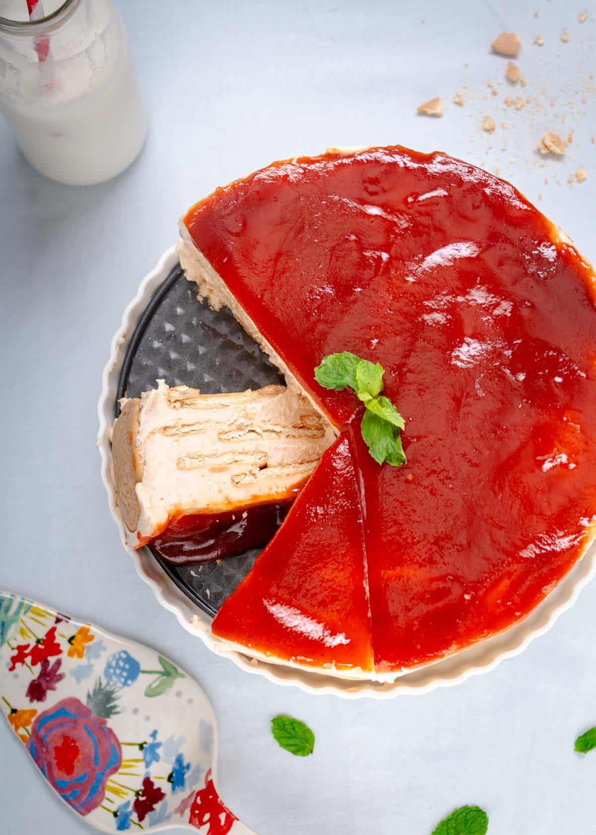 Flat lay of the guava Carlota cake with a slice cut out.