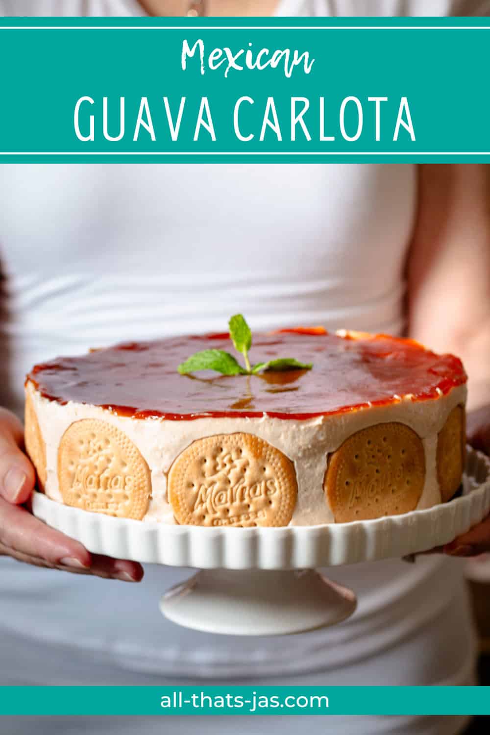 A person holding cake stand with guava Charlotte, with text overlay.