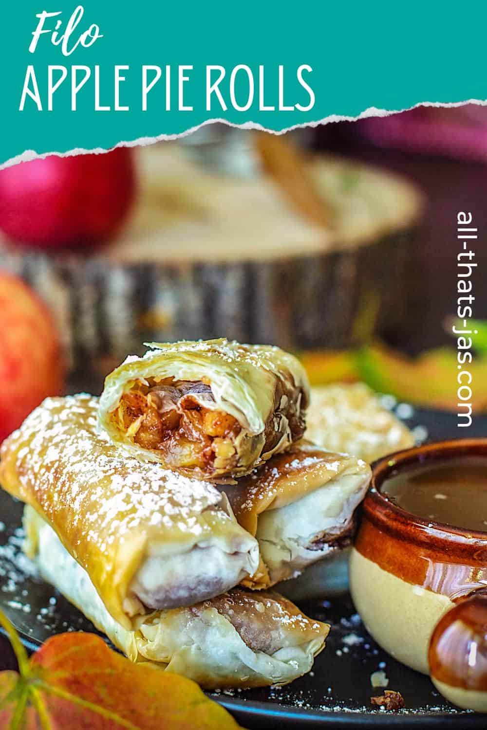 Apple pie spring rolls on a plate with text overlay.