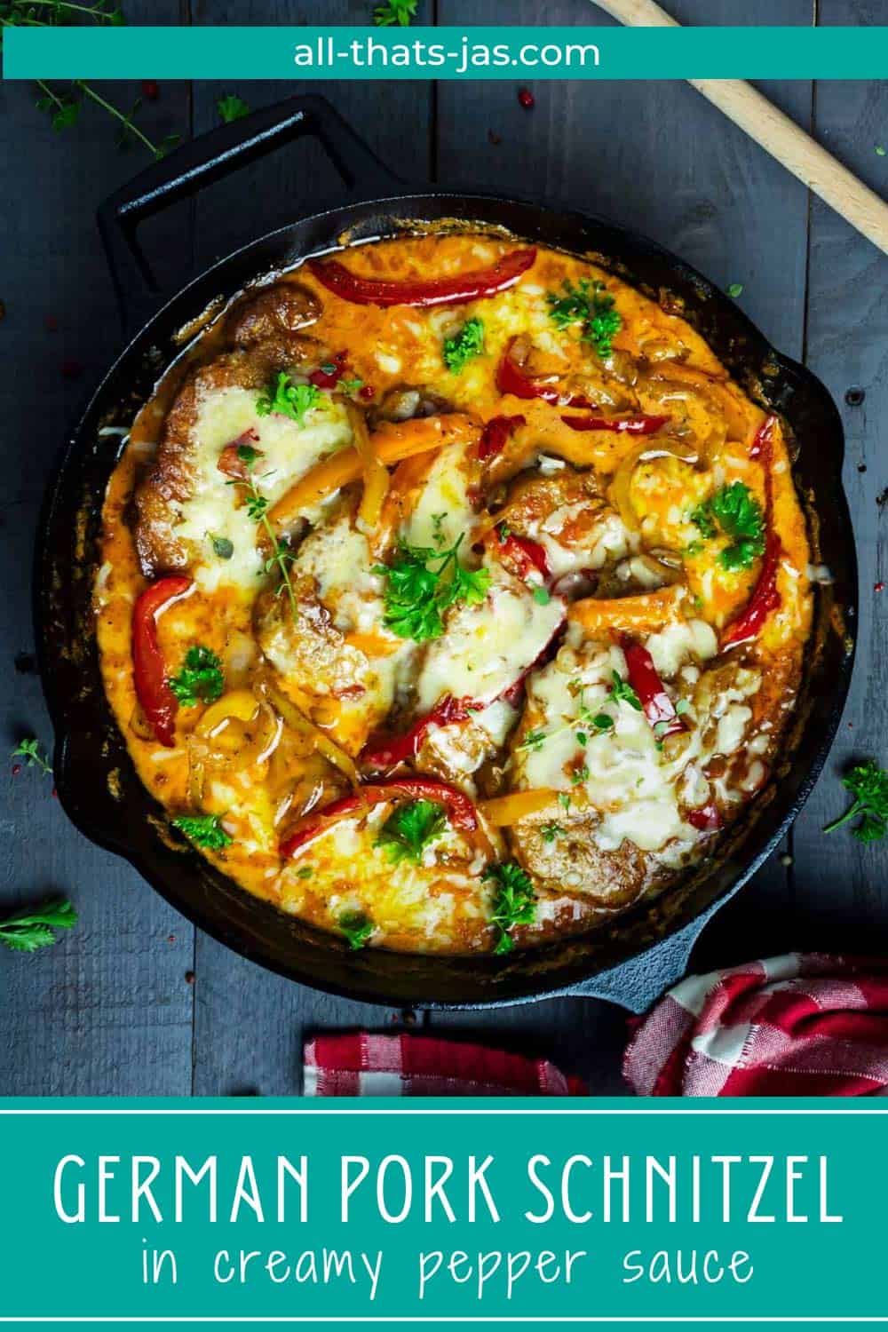 An overhead shot of a cast-iron skillet with pork schnitzel in a pepper sauce with text overlay.