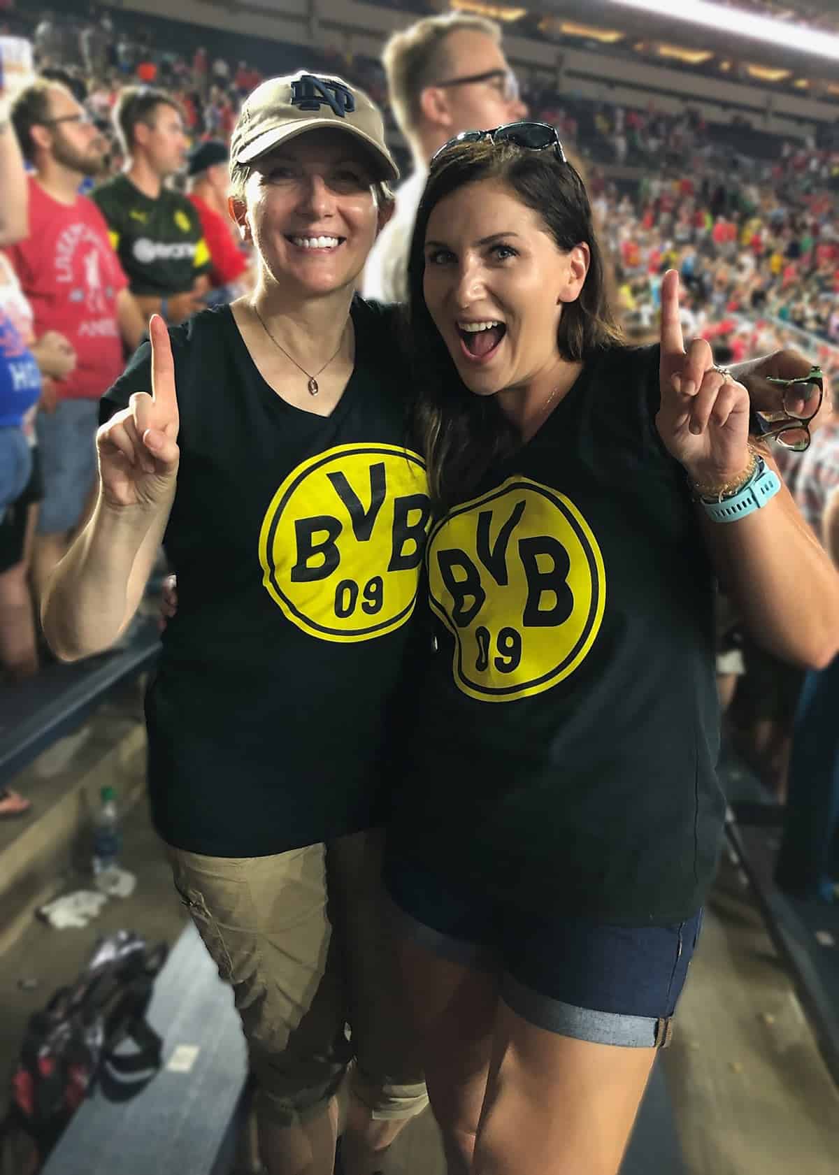 Jas and her daughter at a soccer game.