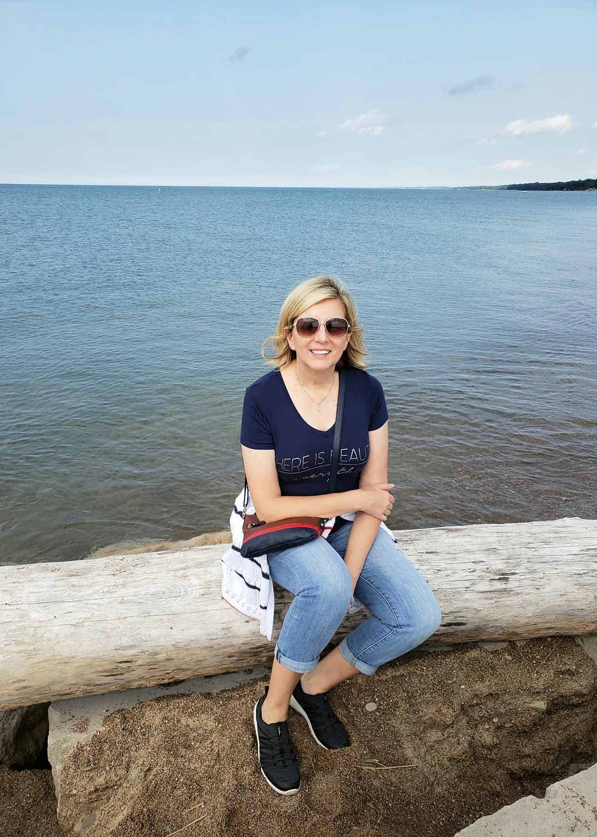 Jas sitting by the sea.