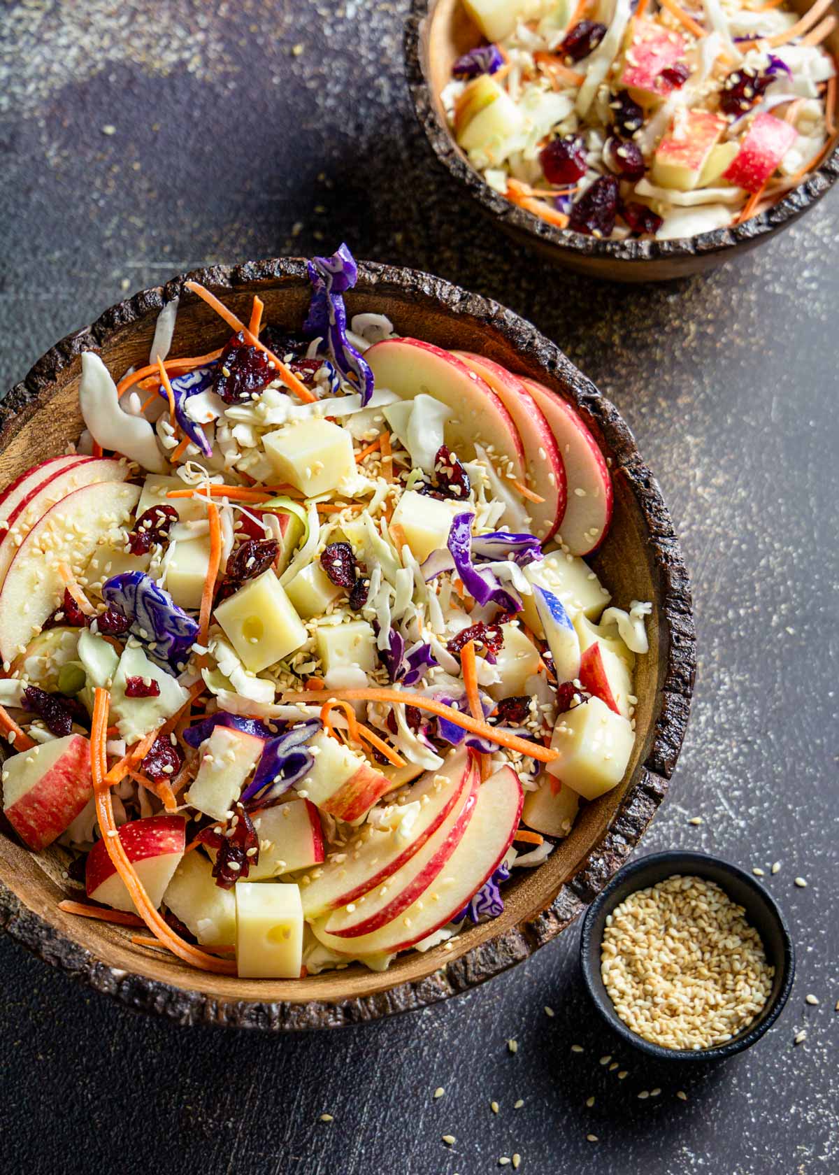 Asian-style salad with cabbage, apples, and Swiss cheese.